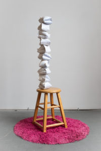 Media includes cast porcelain, glaze, lustre, walnut, steel, shag rug.