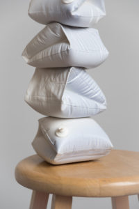 Media includes cast porcelain, glaze, lustre, walnut, steel, shag rug.