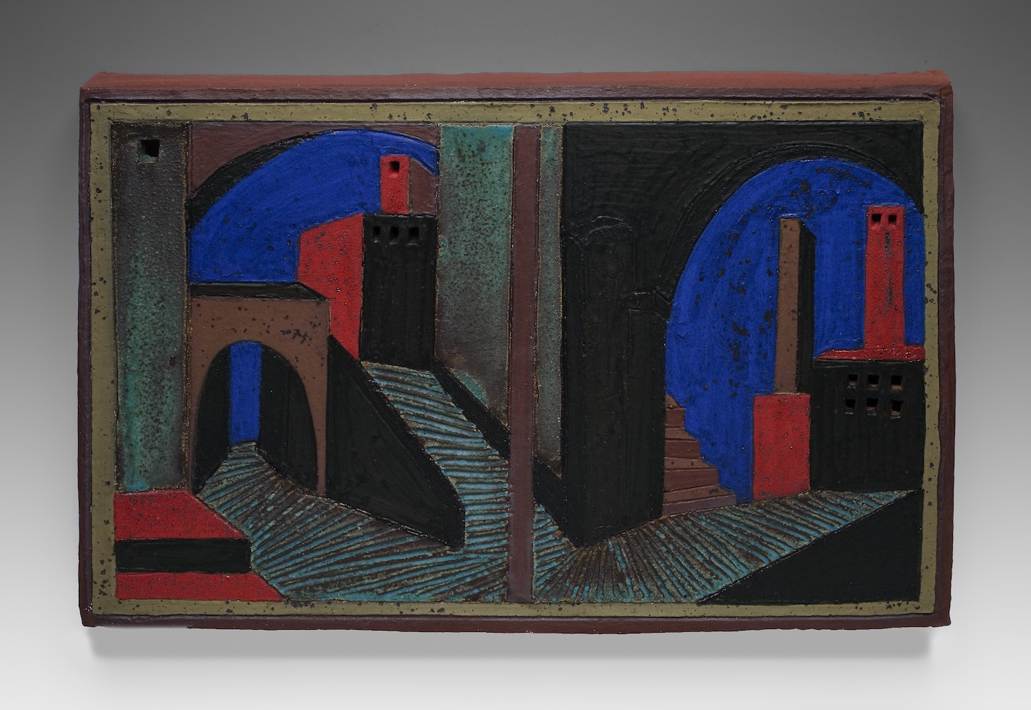 This is a clay painting. It is to be hung on the wall.