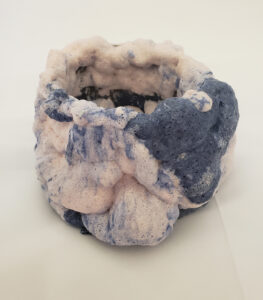 In 2024, I devised a recipe and firing schedule for art foam glass by studying chemical engineering of foam glass for architectural insulation.  I have been experimenting with combining foam glass with plate glass and ceramic, using various colorants in the glass.  Conceptually, the challenge is to “give physical form to air and other formless particles and vibrations.”  Sculptures range from 4” X 4” X 2” to 6” X 6” X 6”