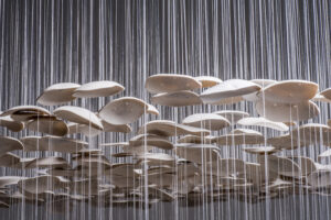 750 components. Porcelain, glass dust, microfilament. The detail highlights the filament as a fundamental aspect of the piece. Photo credit: Jeremy Addington