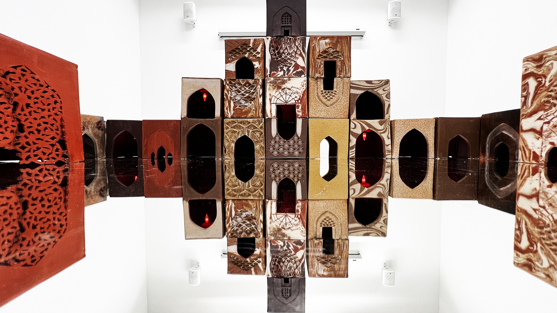 The pieces in this installation have been fired to different temperatures and atmospheres ranging from oxidation low  to reduction high temperatures.