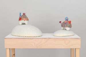 Ceramic, layered porcelain slip, colored porcelain, felted wool, foam