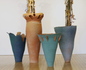 Materials: Earthenware, Upcycled and Macramé Bedding, Rust Dye, Handmade Paper Pulped from Upcycled Clothing