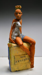 The child Hatshepsut with pet rabbit, daydreaming about being king.