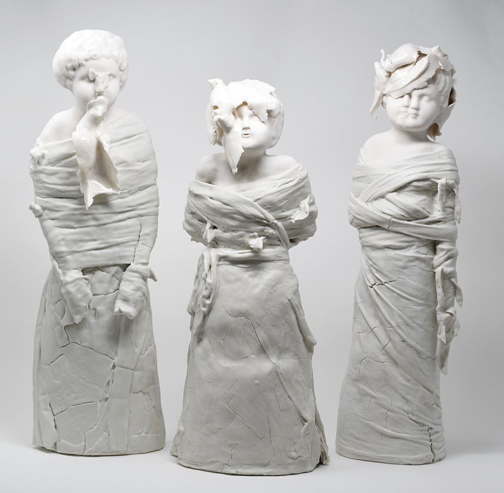 Asylums often allowed patients to keep caged canaries. What they did with them was their business. Birds were press-molded then stretched and purposely misshaped.  Straight-jackets & skirts made from slip-dipped workman blue, disposable  paper towels -  it was the man who often made the admittance call to the asylum.