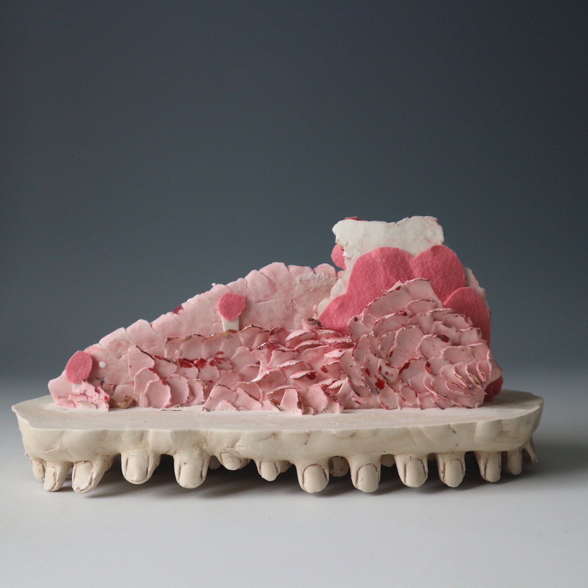 Porcelain. plaster. Recycle material fabric. nail polish