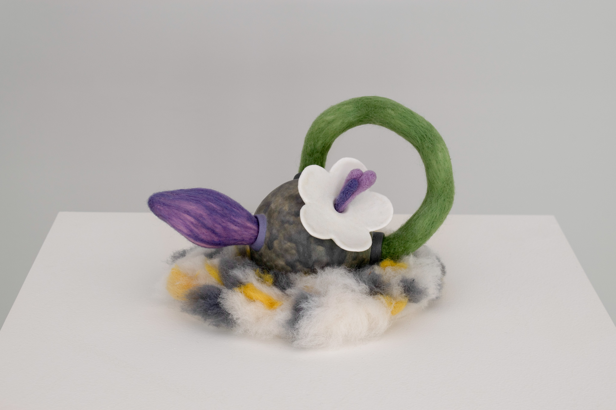Ceramic, colored porcelain, needle felted wool