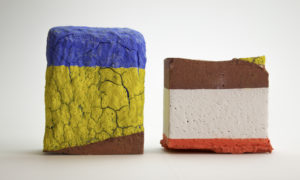 Raw brick altered, fired, underglaze_