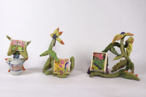 Three sculptures of aster flowers, each with their own specific hand-made booklet, presented as a trilogy