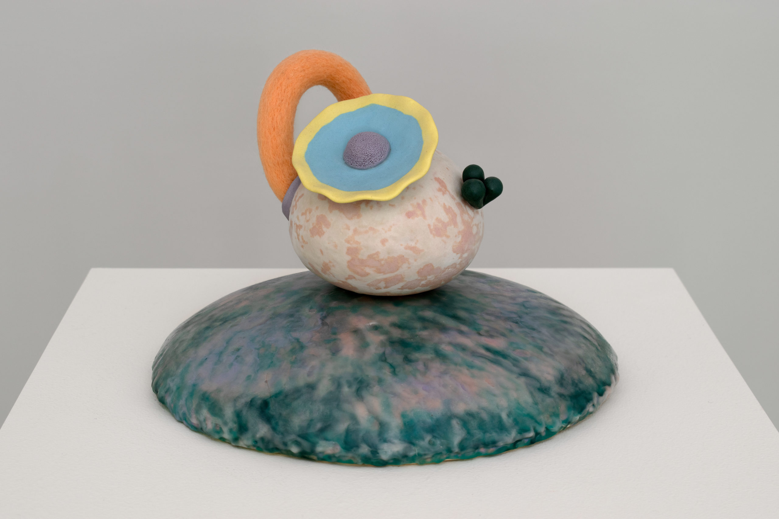 Ceramic, colored porcelain, needle felted wool, encaustic wax