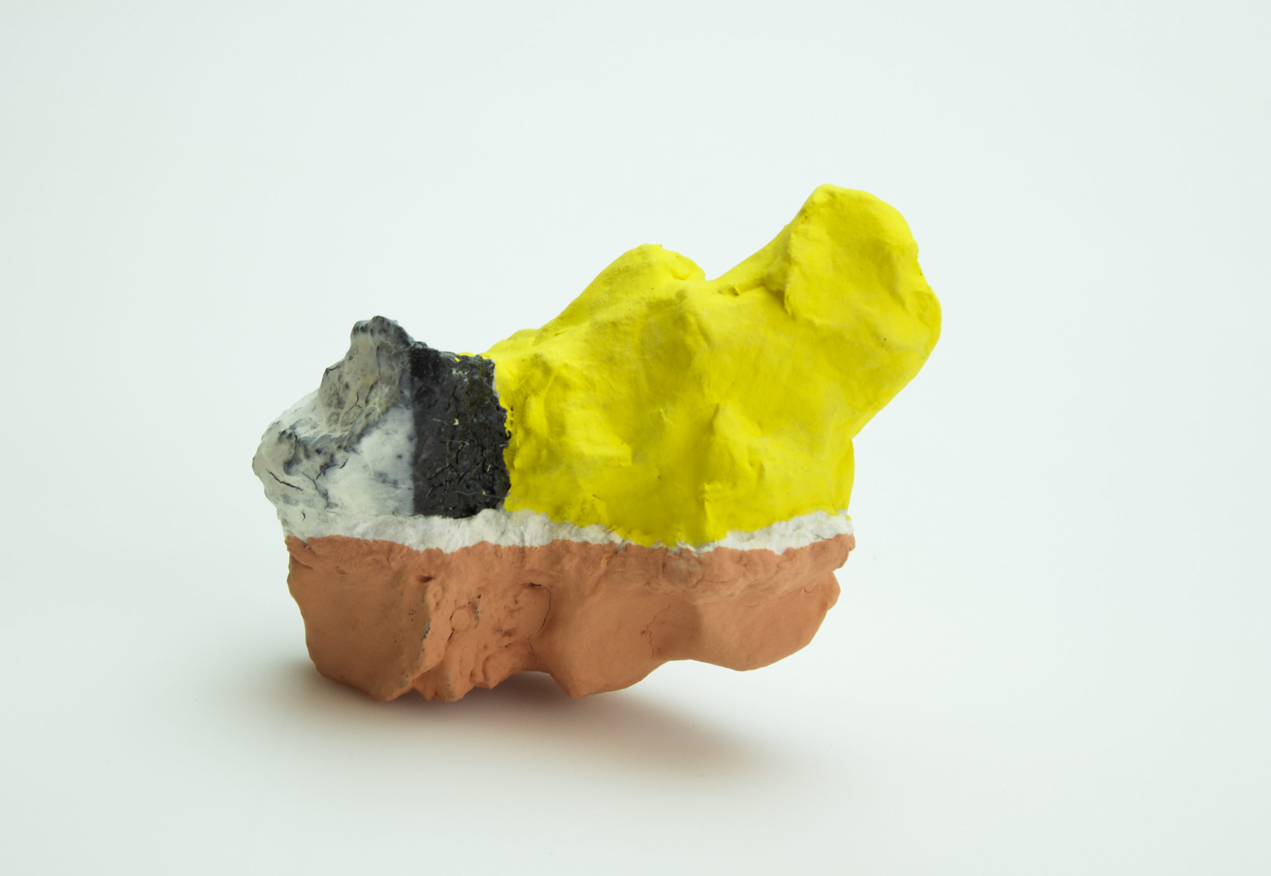 Fired ceramic, underglaze, paper additions