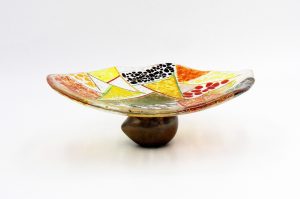 Slump glass and ceramic base