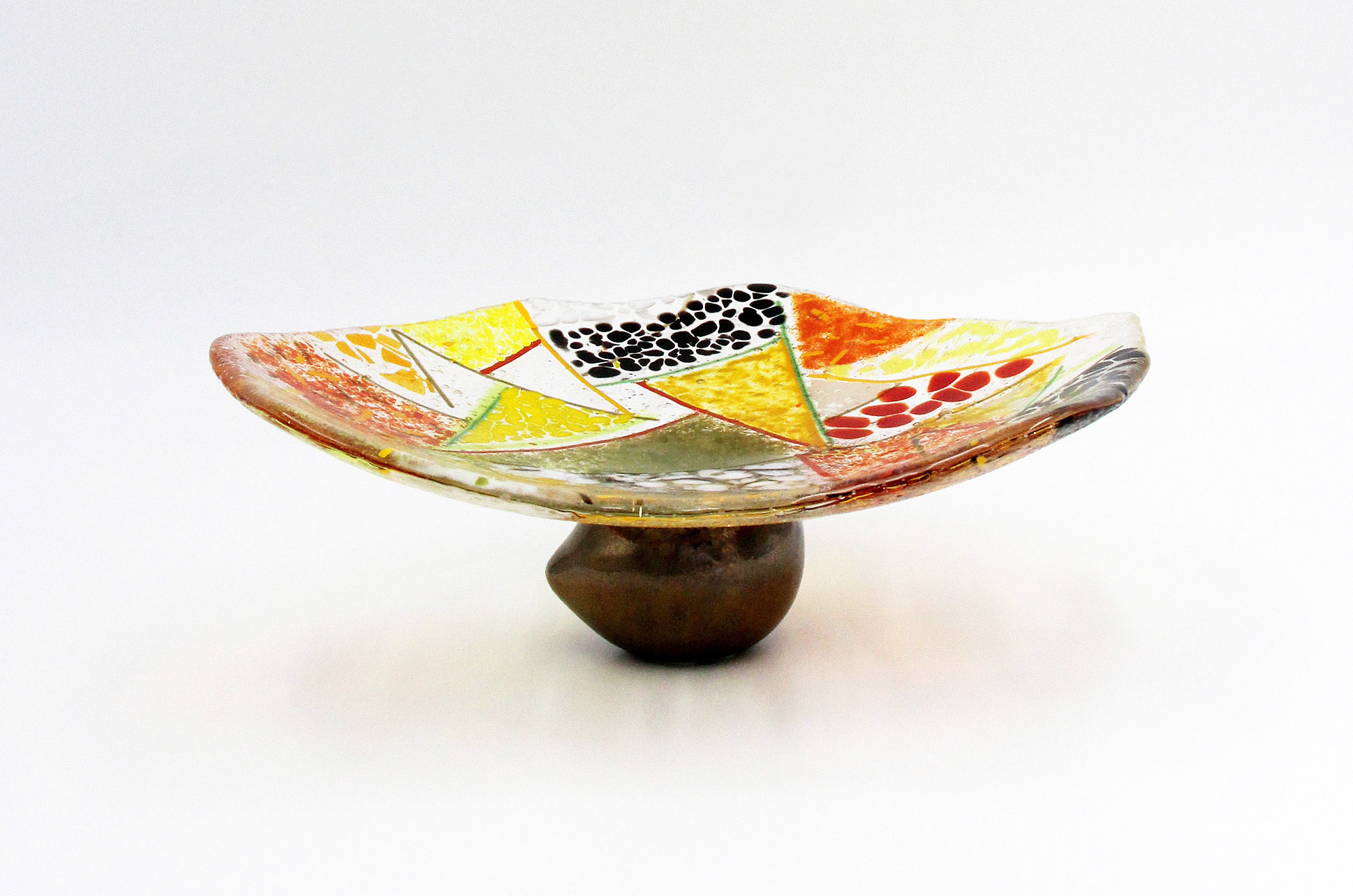 Slump glass and ceramic base
