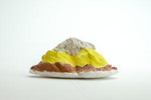 Fired and underglazed ceramic, cast paper additions