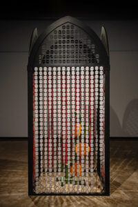 This 12-foot tall mixed-media sculpture uses 3,840 stitched together ceramic watermelons to visually express the distinct contrast between the perception of Palestinians and the reality I’ve always known as a Palestinian-American. This work addresses stereotypes, propaganda, misinformation, and censorship surrounding the image of Palestine within pop culture, while extending Palestinian traditions. Screen printed and hand painted watermelons act as a barrier, creating a protected space for a sculpture of the Beit Dajan orange blossom tatreez (embroidery) pattern.