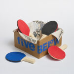 The Box with Newspaper is 11"x11"x7" and the ping pong paddles are 6"x10"3/4"