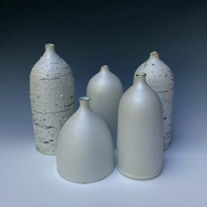 Porcelain with feldspar and molochite inclusions