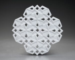 hand-carved surface (front and back)