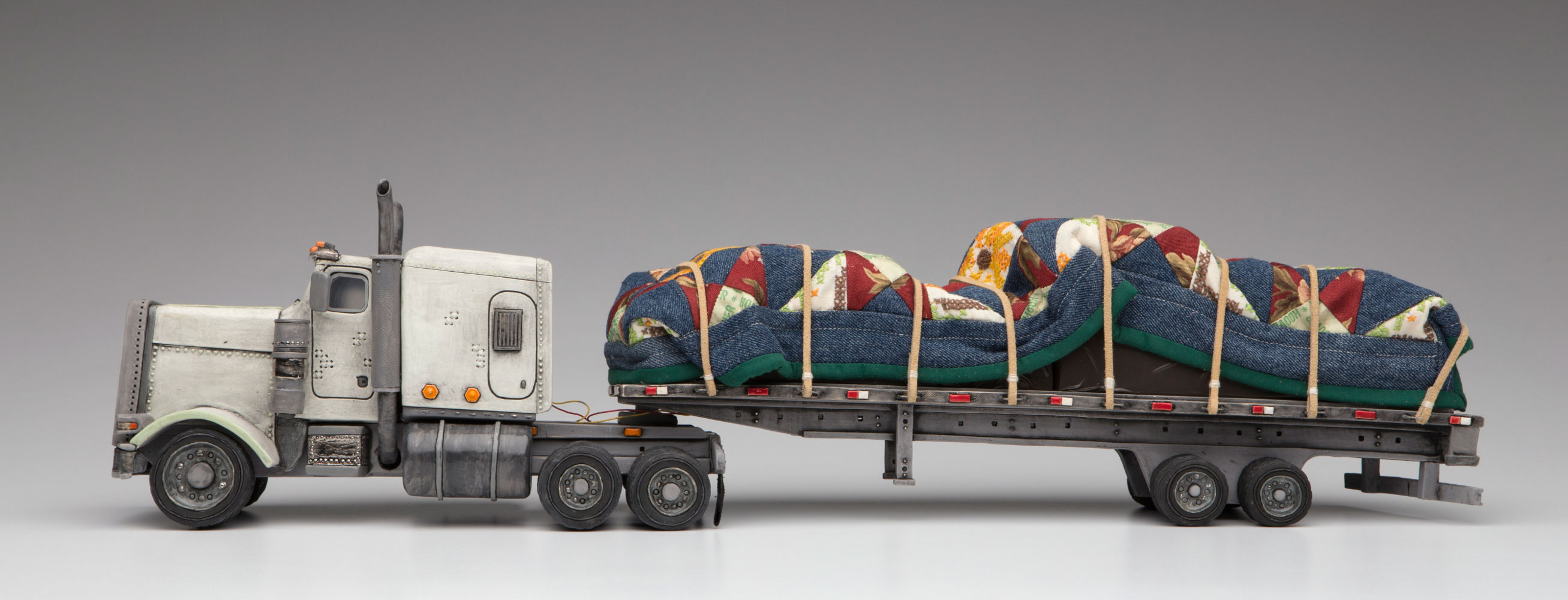 2017, Ceramic, embroidery, quilt, mixed media. 18”x5”x7”