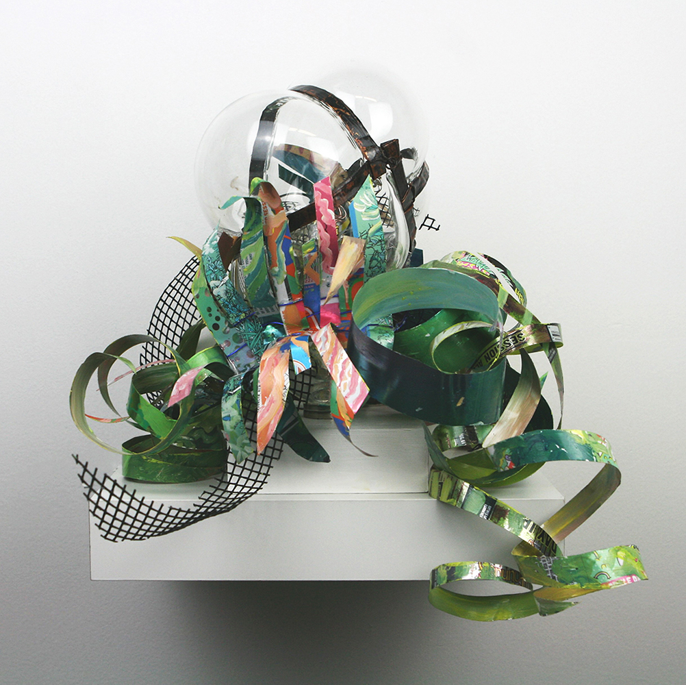 Hand blown glass with repurposed aluminum and plastic that has been hand painted.