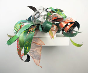 Hand blown glass with repurposed aluminum and plastic that has been hand painted.