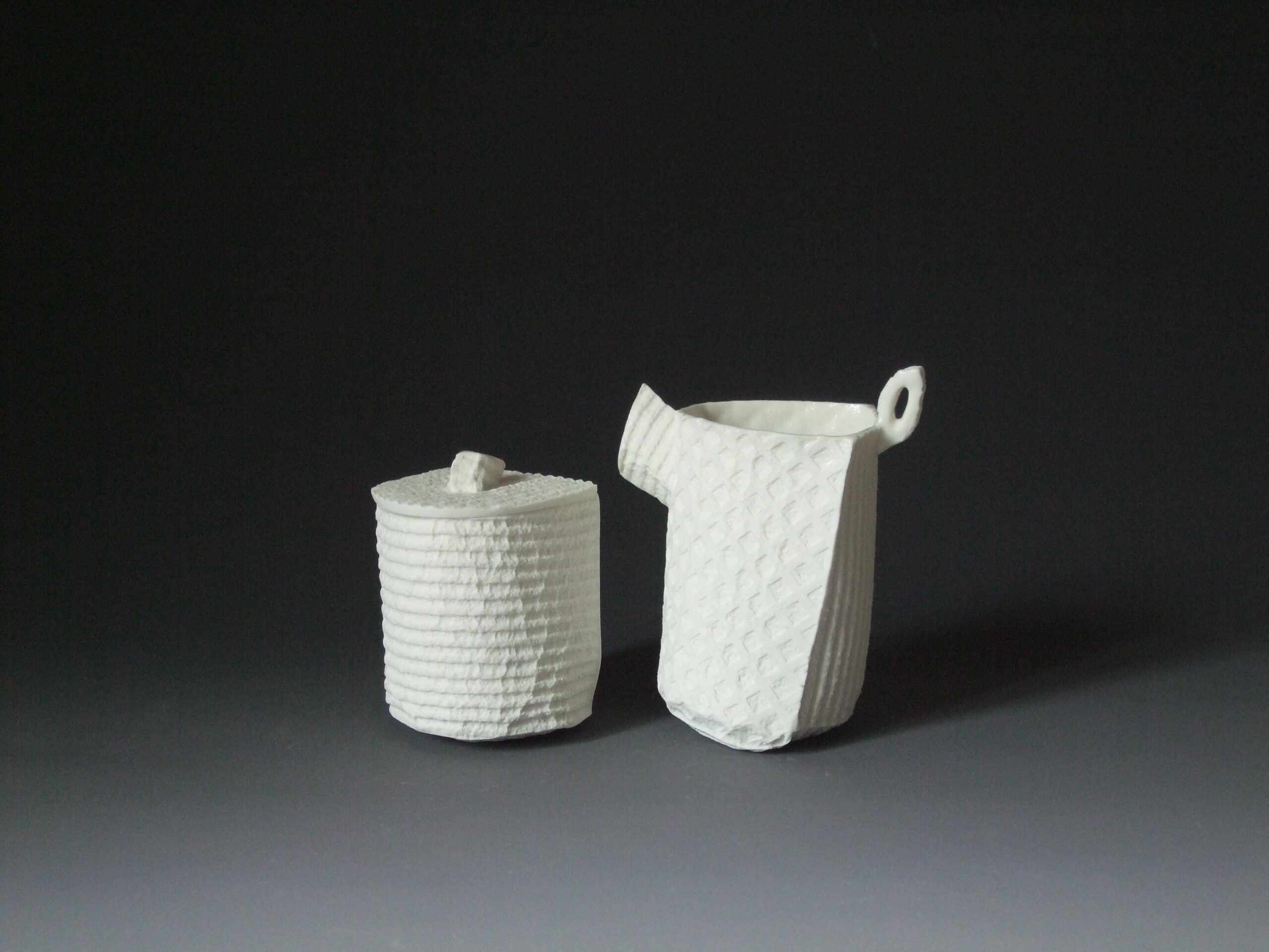 This series was selected for honorable mention award in Mino Japan in 2010. The work was made from flat cellulose sponges that have been sewn together to make soft, single use molds for porcelain slip.