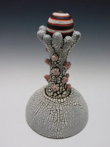 Covered vessel with sculptural intent