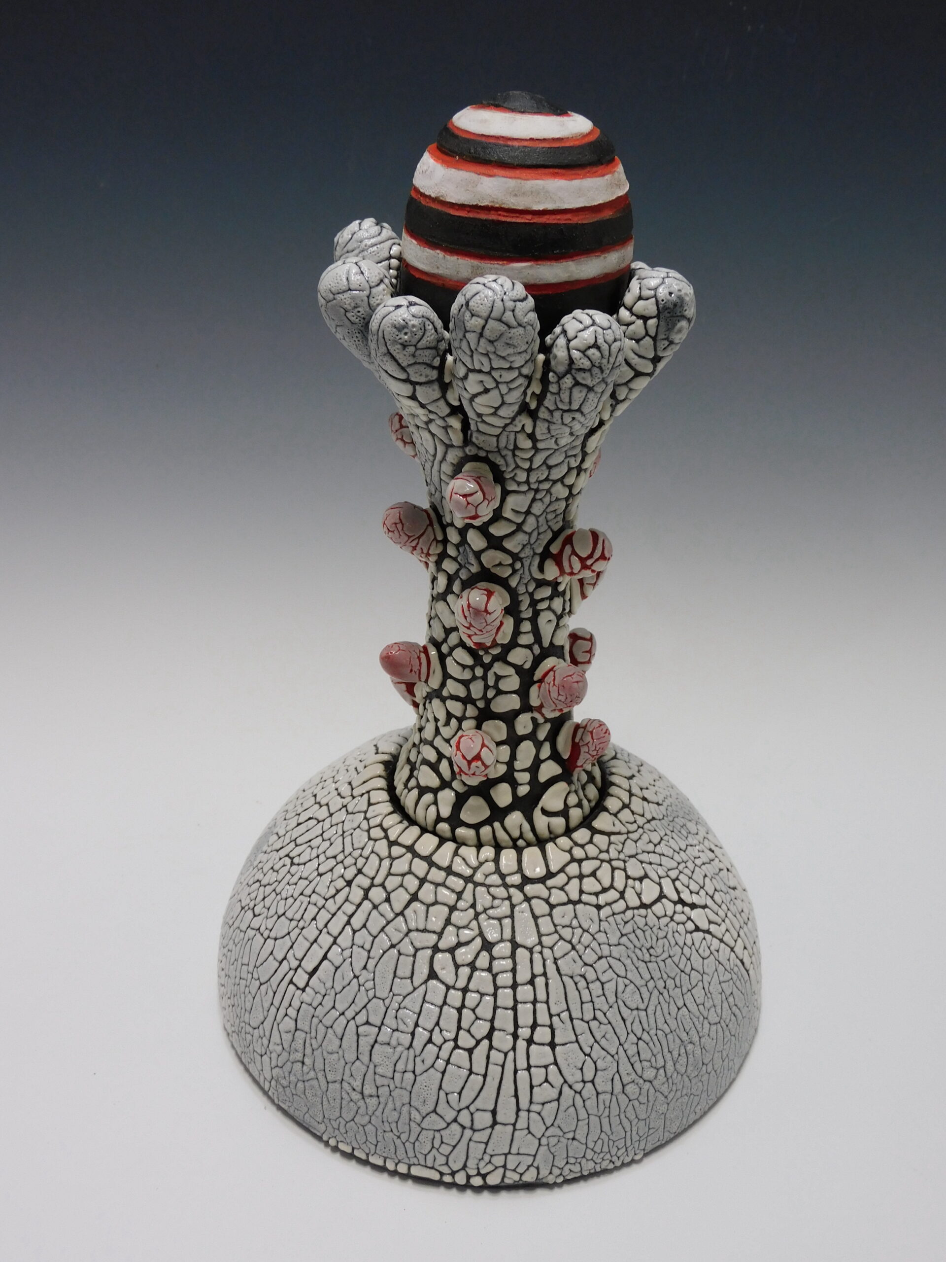 Covered vessel with sculptural intent