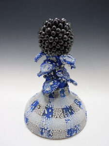 Covered vessel with sculptural intent