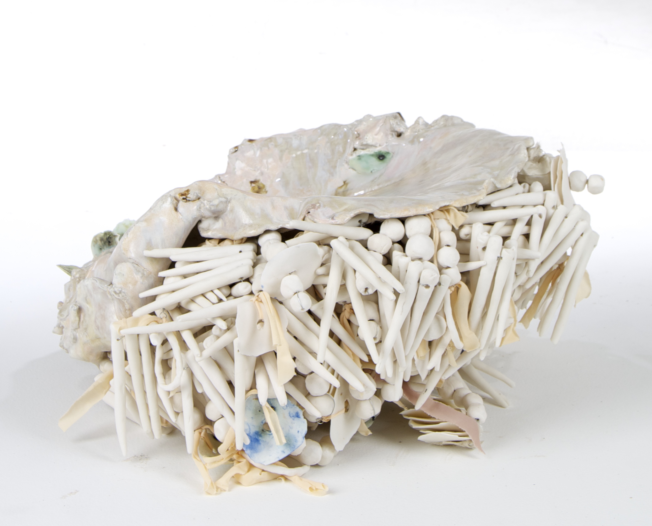 Clay, glaze, oxides, wire, torn women's slips