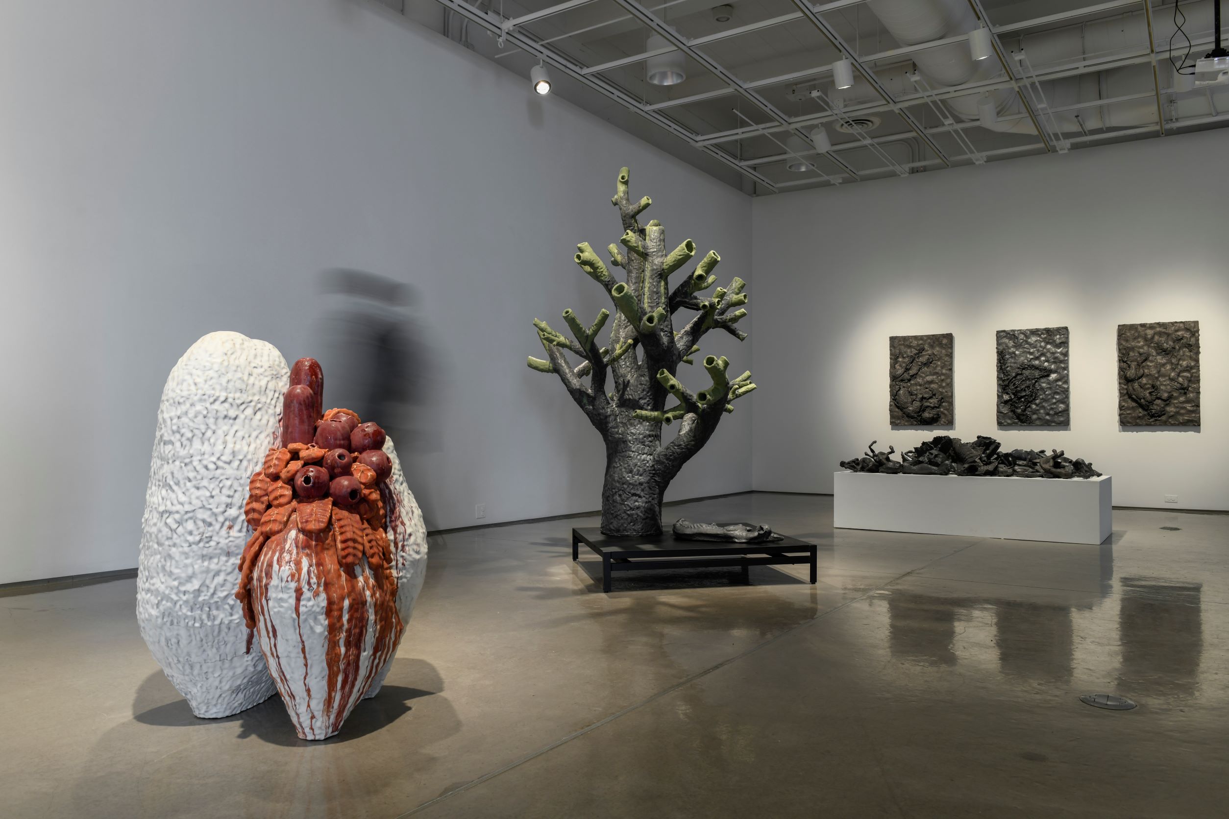 This is an installation shot from my MFA thesis exhibition. The ceramic sculptures were paired with a video perfromance projected on the wall wich included a sonic component that fille the room every three minutes.