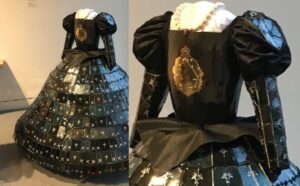 Over 750 hand-made/slabbed porcelaineous stoneware tiles, hand decorated, era-accurate dress; hand thrown/altered torso, with gold luster inlay; handmaid ceramic beads and amethyst necklace; fiber is nylon/polyester (both for waist and dress)