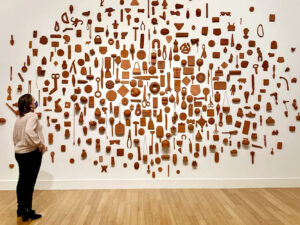 terra cotta objects on a white wall