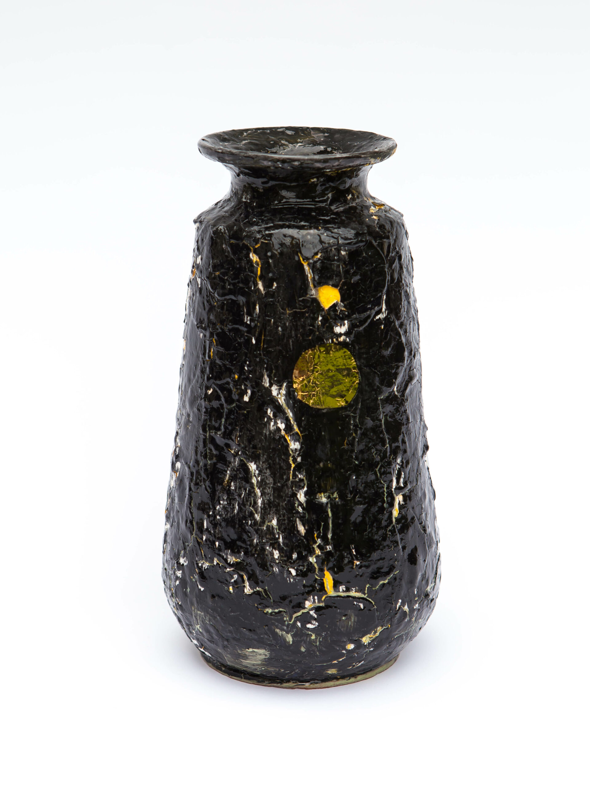 Freedom For Palestine is work deal with the way people live in Palestine under occupation. The shape of the vase is mediterranean traditional vase.