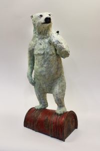 Matte glaze is sealed with acrylic stains.  Pieces fired separately and assembled post-firing with epoxy and wire.