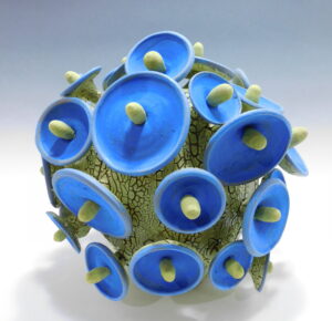 covered vessel with sculptural intent