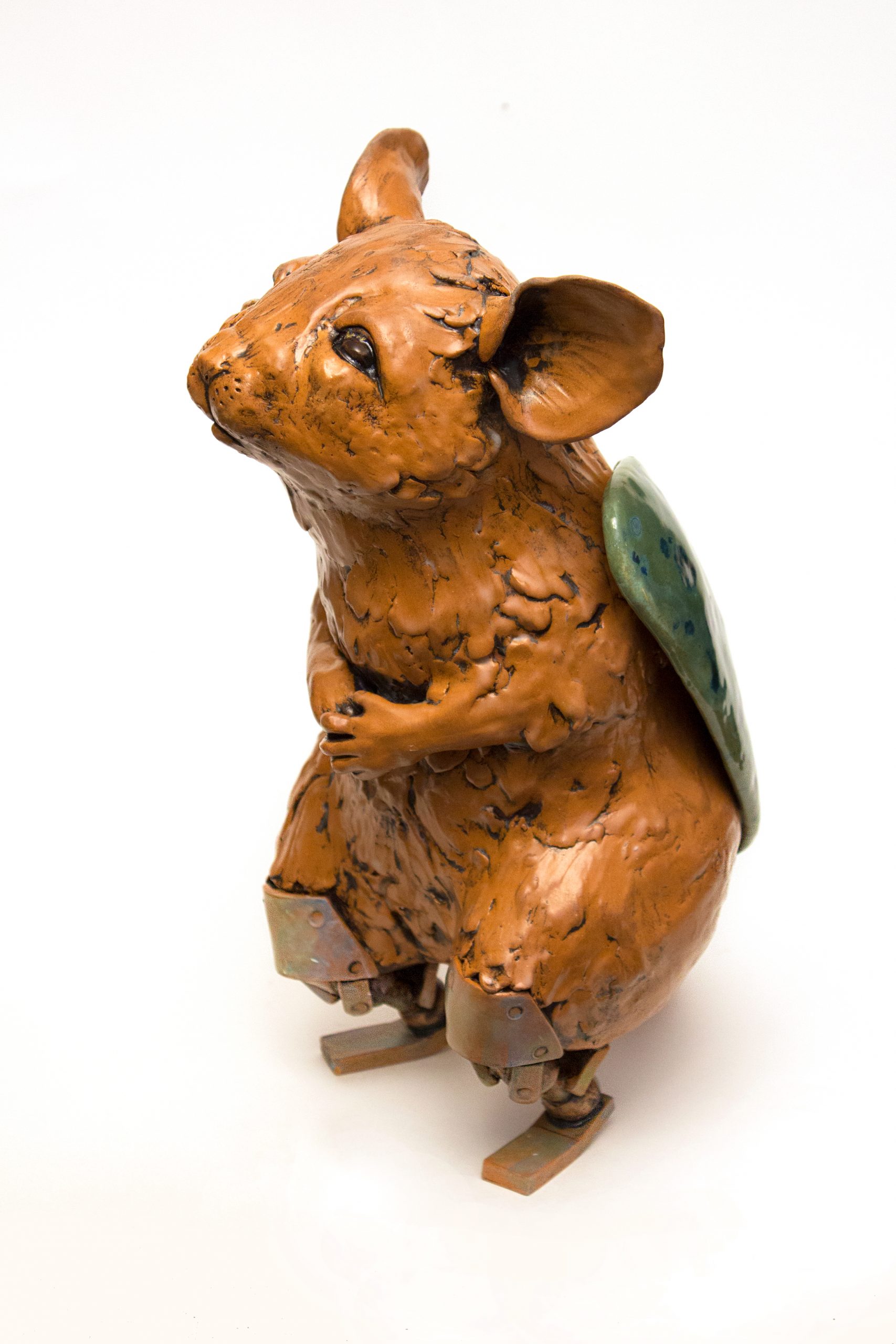 Piece includes components that were fired separately and attached post-firing.