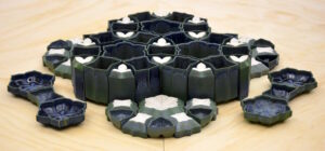 These forms were slip cast. The plaster molds were cast around 3D printed prototypes. The prototypes were designed in Rhino referencing Islamic patterns.