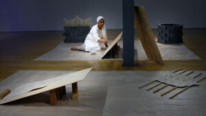 Four-hour long performance in which the artist uses water to paint the same mark repeatedly on bone-dry slabs. The piece explores the meaning of home, belonging and creating space.