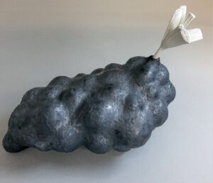 Unglazed, slipcast, mid-range porcelain 'flesh flower' emerging from the glazed, mid-range stoneware, biomorphic form