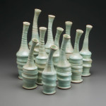 2015, vary 15” x 6” x 5” (h x w x d), Porcelain clay, Green Glaze, Wheel thrown, altered and assembled clay that has been glazed and fired in oxidation to cone 6 in an electric kiln.