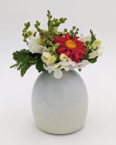 I worked with a local florist on the design for this bud vase form to quietly support and highlight their flowers while having a large reservoir of water available for the buds. It was also crucial for the vases to be low as they are used in a local cafe & coffee shop and they need to allow for activity and conversations to happen around them.