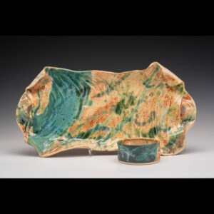 Highly textured slab built white stoneware platter with wheel thrown dip bowl.