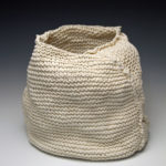 7.5"h x 8"w x 5"d, 2017, hand knit cotton, dipped in porcelain slip, fired cone 6 oxidation, unglazed.
