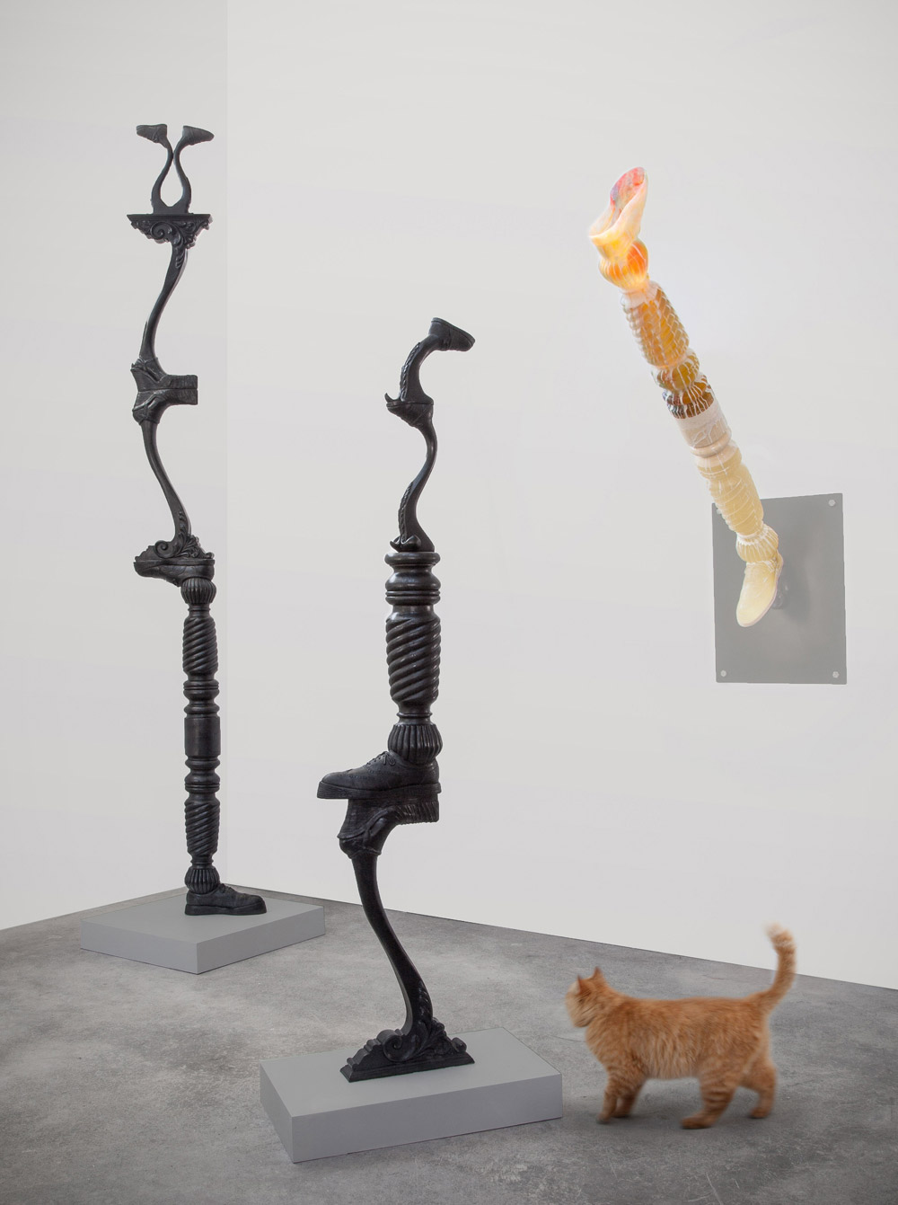 Left to right: “Family Tree” (124” x 26” x 26”), Totter (78” x 15” x 26”), and Kick (58” x 44” x 18”). 2016. Cast resin, paint, steel, wood.