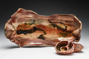 This highly textured sushi set includes a functional white stoneware slab tray with handles and a matching 2-lobed pinch pot condiment set with a pinched clay spoon. It is stained and glazed and fired to cone 6 in oxidation and is microwave and dishwasher safe  with lead free glaze mixed up in my studio.