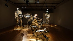 - porcelain sculptures, multi-fired, underglazed, painted and glazed, on wooden bases and structures - pyrography on wood, painted, varnished- 2016 solo exhibition series Match at public gallery Art-image in Gatineau- awarded the Prix du CALQ – Œuvre de l’année en Outaouais – Work of the Year in the Outaouais 2017, and recently exhibited in the solo public exhibition Source et ressource at the Centre D’Art Rotary in La Sarre, Quebec from Nov 2019 to Feb 2020- a visual exploration of the manifestation of the boxing sport as transformative of the human figure- the artist allowed the town of Buckingham’s emotional investment in their boxing hero Gaétan Hart to become the central theme