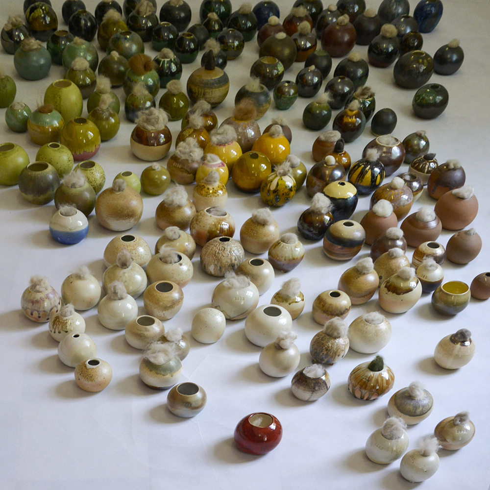 Installation of 350 clay pots, animal hair, video.