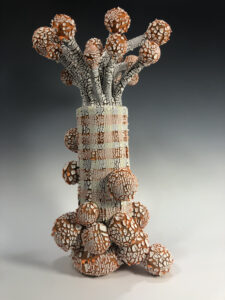 covered vessel with sculptural intent